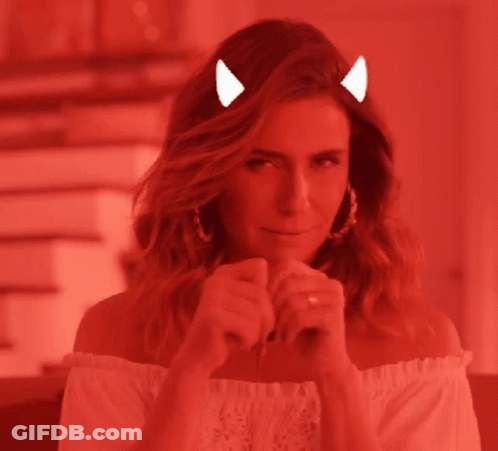 A Woman With Devil Horns On Her Head And A Tail GIF