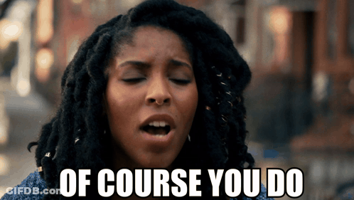 A Woman With Dreadlocks Is Making A Face And Says Of Course You Do GIF