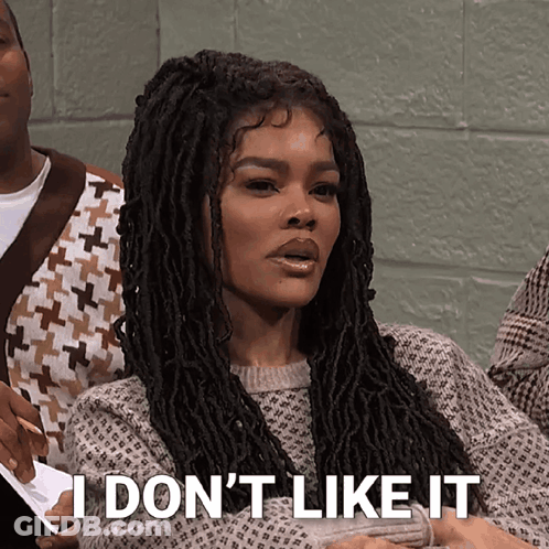 A Woman With Dreadlocks Is Saying I Don 'T Like It GIF