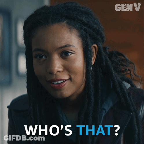 A Woman With Dreadlocks Is Smiling And Asking Who 'S That GIF