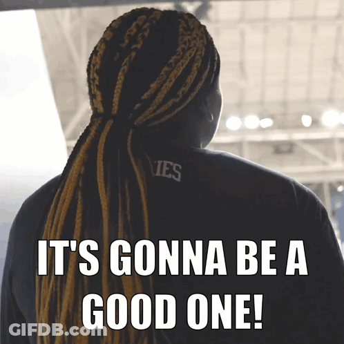 A Woman With Dreadlocks Is Wearing A Shirt That Says Yes GIF