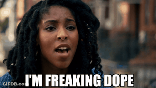 A Woman With Dreadlocks Says " I 'M Freaking Dope " In Front Of Her Face GIF