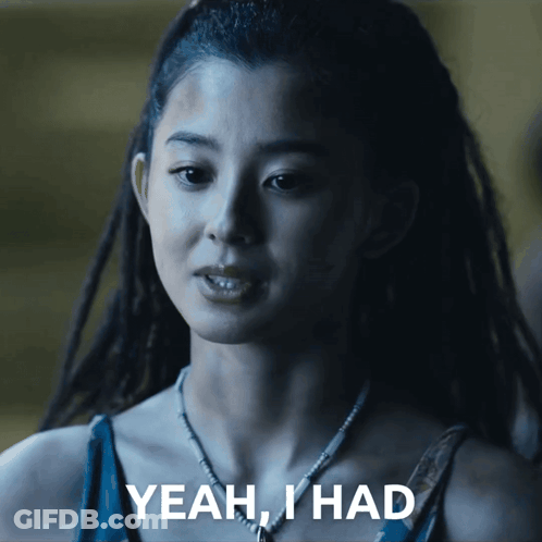 A Woman With Dreadlocks Says " Yeah I Had " In White Letters GIF