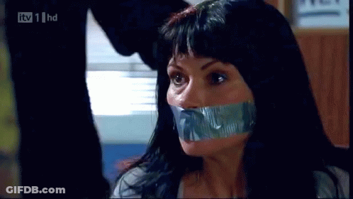 A Woman With Duct Tape On Her Mouth Is On TV 1 Hd GIF