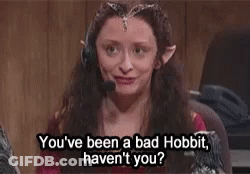 A Woman With Elf Ears Is Wearing A Headset And Talking On A Phone . GIF