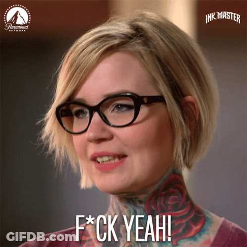 A Woman With Glasses And A Tattoo On Her Neck Says F*ck Yeah GIF