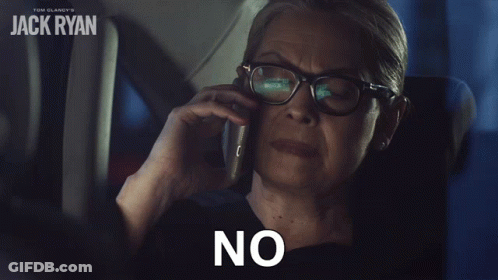 A Woman With Glasses Is Talking On A Cell Phone And The Word No Is On The Screen GIF