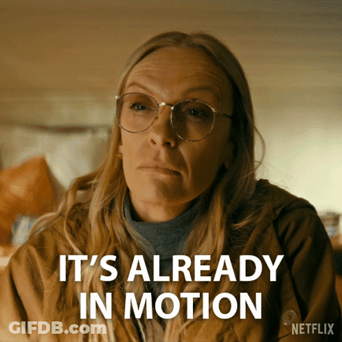 A Woman With Glasses Says It 'S Already In Motion On A Netflix Ad GIF