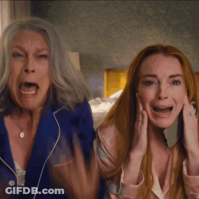 A Woman With Gray Hair And A Woman With Red Hair Screaming GIF