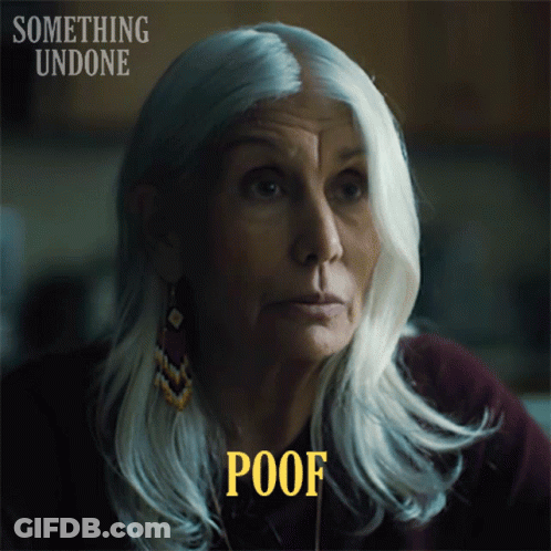 A Woman With Gray Hair Has The Word Poof Above Her Head GIF