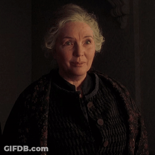 A Woman With Gray Hair Is Smiling And Says How Do You Do Children GIF