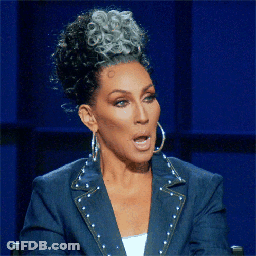 Woman With Gray Hair Wearing Blue Jacket GIF