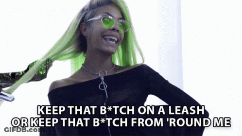 A Woman With Green Hair And Sunglasses Says Keep That B * Tch On A Leash Or Keep That B * Tch From ' Round Me GIF