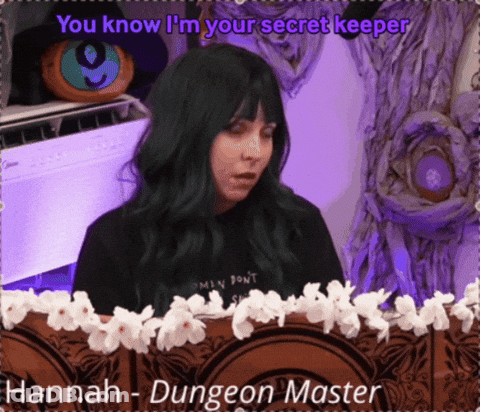 A Woman With Green Hair Is Standing In Front Of A Sign That Says " Hannah - Dungeon Master " GIF