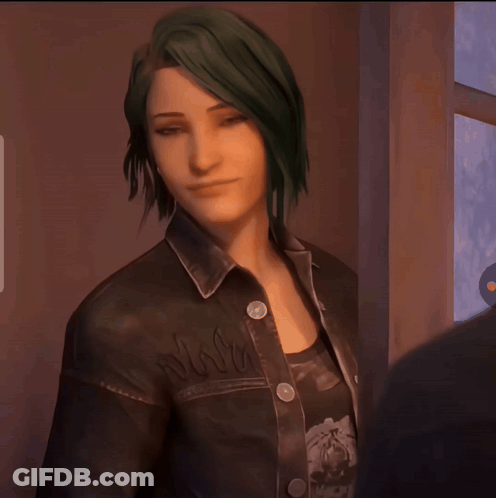 A Woman With Green Hair Is Wearing A Black Jacket With The Word Wolf On The Front GIF