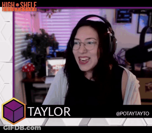 A Woman With Headphones And The Name Taylor On The Bottom GIF