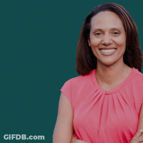A Woman With Her Arms Crossed Is Smiling In Front Of A Green Background That Says Vote Sydney GIF