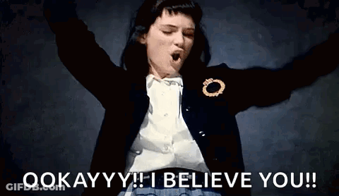 A Woman With Her Arms In The Air And The Words `` I Believe You '' Written Below Her . GIF