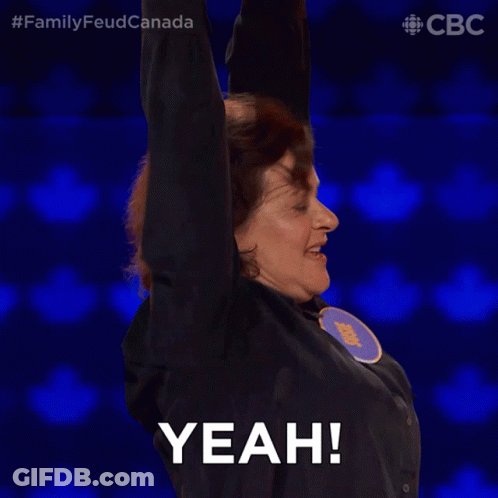 A Woman With Her Arms In The Air Says Yeah On A Blue Background GIF