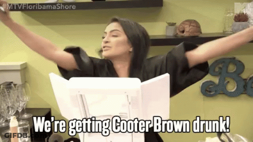 A Woman With Her Arms Outstretched Says " We 'Re Getting Cooter Brown Drunk ! " GIF