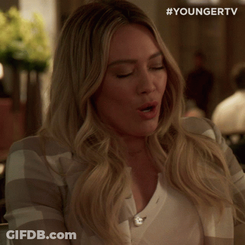 A Woman With Her Eyes Closed And The Hashtag Youngertv GIF