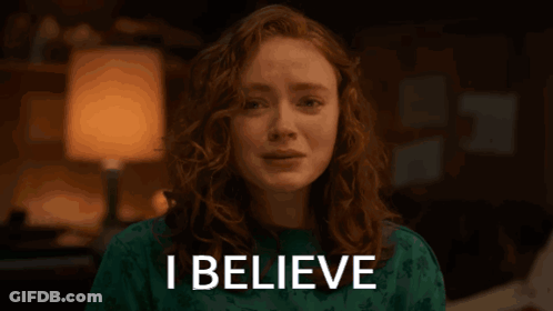 A Woman With Her Eyes Closed And The Word I Believe Above Her Head GIF