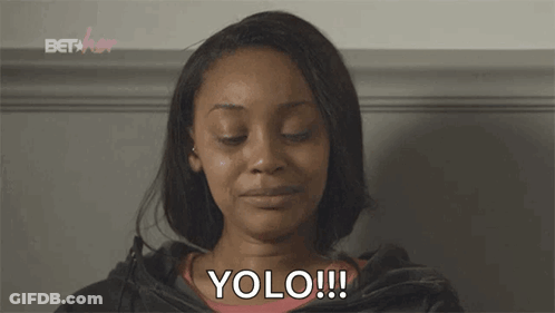 A Woman With Her Eyes Closed And The Word Yolo Written On Her Face GIF