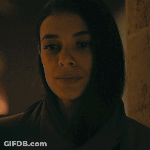 A Woman With Her Eyes Closed And The Words You 'Re Not Leaving Above Her GIF