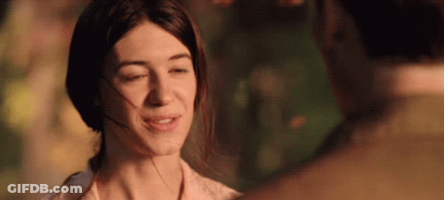 A Woman With Her Eyes Closed Looks At A Man With His Eyes Closed GIF