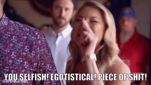 A Woman With Her Finger In Her Nose Says You Selfish Egotistical Piece Of Shit . GIF