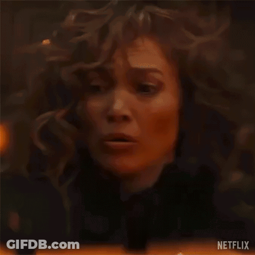 Woman With Windblown Hair Asking What Do I Do GIF