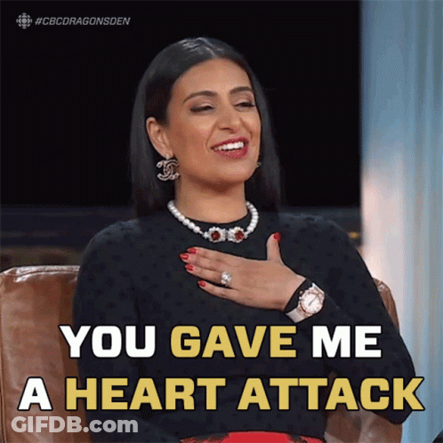 A Woman With Her Hand On Her Chest And The Words You Gave Me A Heart Attack Above Her GIF