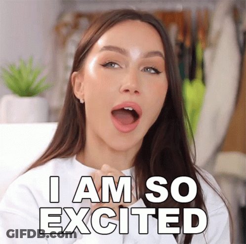 A Woman With Her Mouth Open And The Words I Am So Excited Behind Her GIF