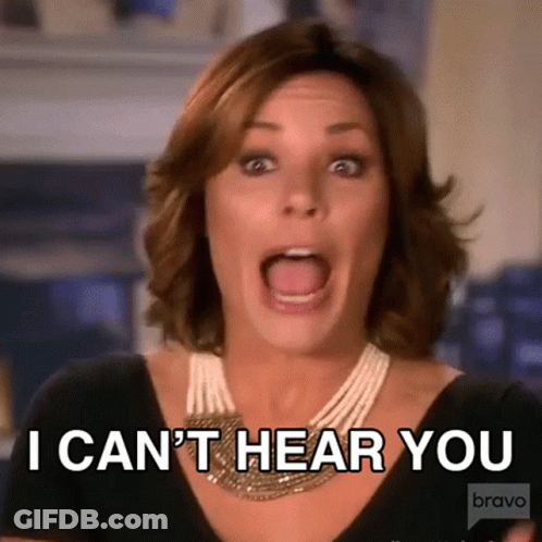 A Woman With Her Mouth Open And The Words I Can 'T Hear You Behind Her GIF