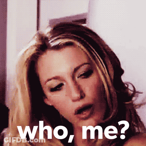 A Woman With Her Mouth Open And The Words Who Me Behind Her GIF