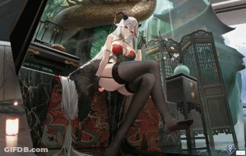 A Woman With Horns Is Sitting On A Couch In A Room GIF