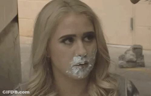A Woman With Icing On Her Face Says I Ate The Baby GIF