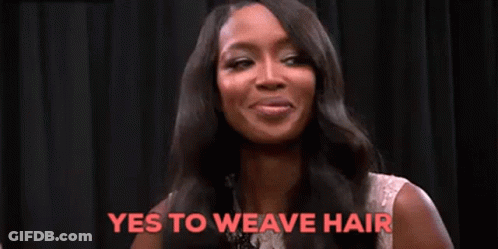 A Woman With Long Black Hair Is Smiling And Saying Yes To Weave Hair . GIF