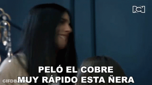 A Woman With Long Black Hair Is Talking In Spanish GIF
