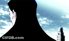 A Woman With Long Black Hair Stands In Front Of A Blue Sky GIF