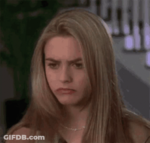 Woman With Long Blonde Hair Making Funny Face GIF