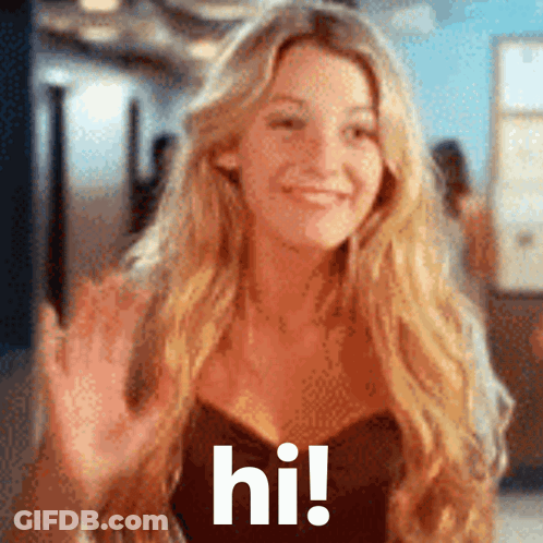 A Woman With Long Blonde Hair Is Waving Her Hand And The Words Hi Are Visible GIF