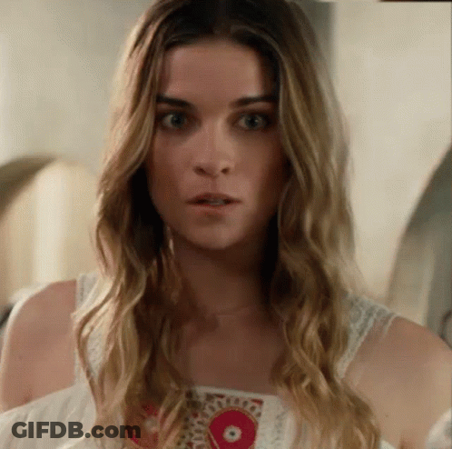 Woman With Long Blonde Hair In White Dress GIF