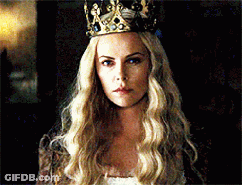 A Woman With Long Blonde Hair Wearing A Crown On Her Head GIF
