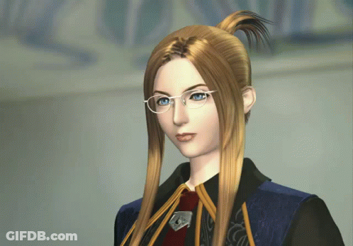 A Woman With Long Blonde Hair Wearing Glasses And A Blue Jacket GIF