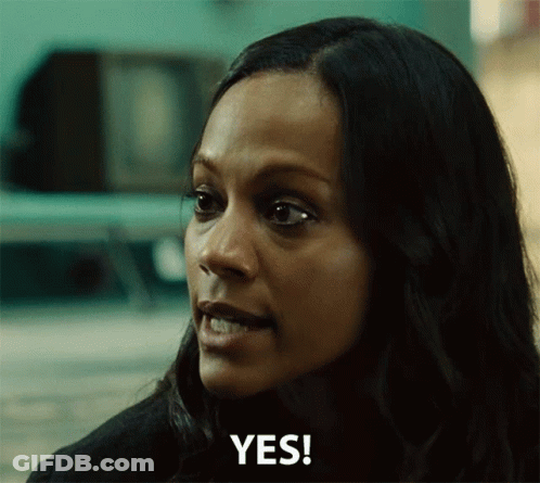 A Woman With Long Dark Hair Says Yes GIF