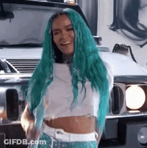 A Woman With Long Green Hair Is Standing In Front Of A White Car . GIF