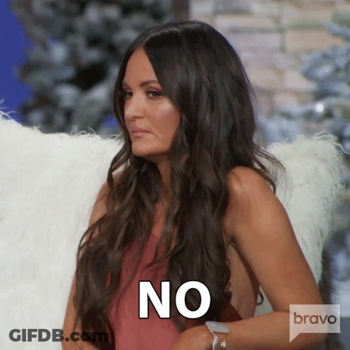 A Woman With Long Hair And A Bravo Logo Behind Her GIF