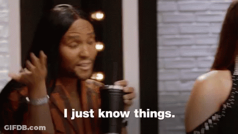 A Woman With Long Hair Is Holding A Cup And Saying I Just Know Things . GIF
