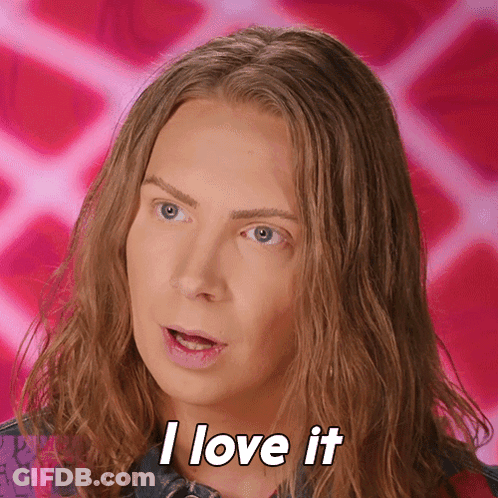 A Woman With Long Hair Is Saying I Love It GIF